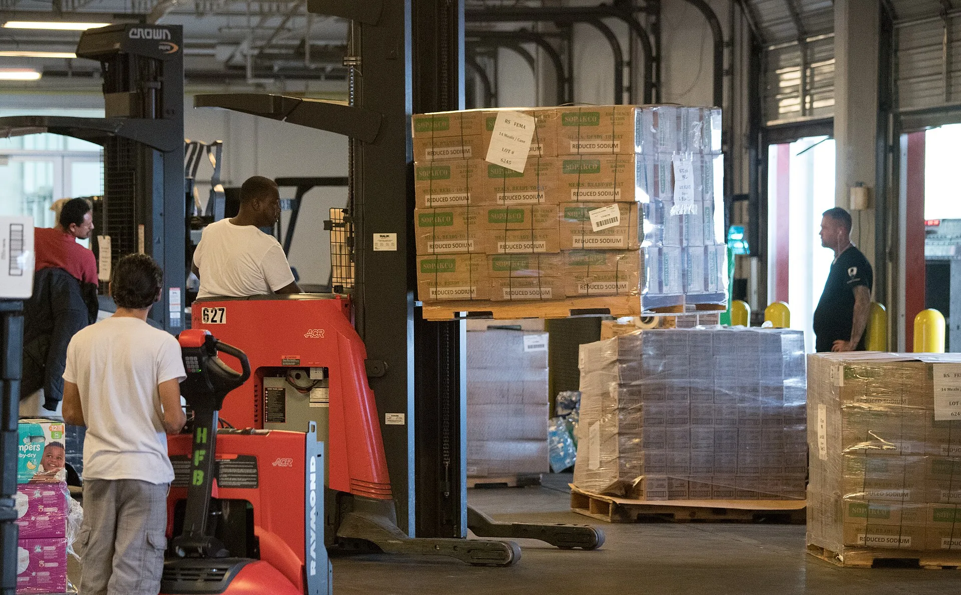 Pallets of FEMA and USDA Emergency Food Assistance Program (TEFAP) commodities are unloaded at the Houston Food Bank commodity warehouse and stored on shelves until needed on packing lines or delivery to food pantries for those in need, in Houston, TX, on September 22, 2017. Houston Food Bank Operat